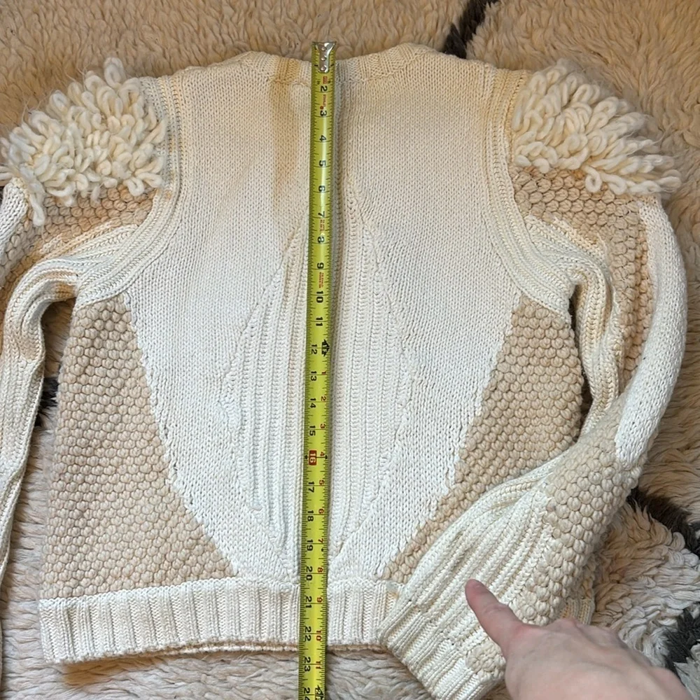 Elegant Cream Sweater with Textured Sleeves